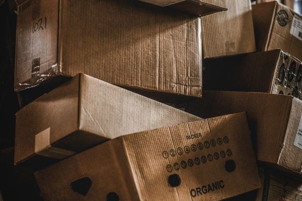 Printed packaging stock in a warehouse — claims printed on cartons are now regulated across the EU